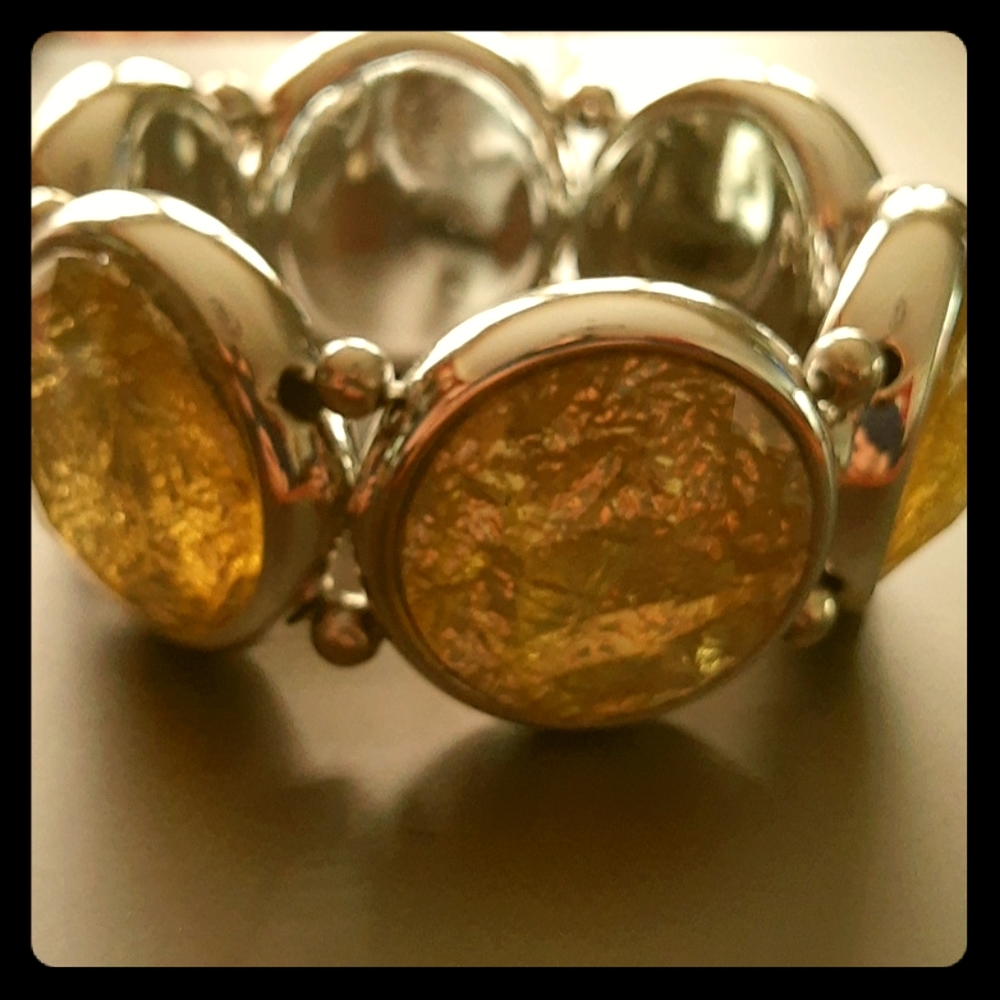 Yellow/gold gem-cut and stone styled bracelet